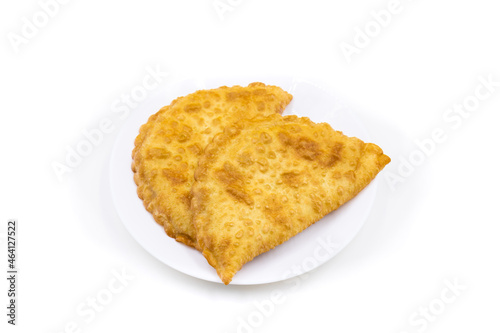Chebureks on a white background. Caucasian cuisine.
