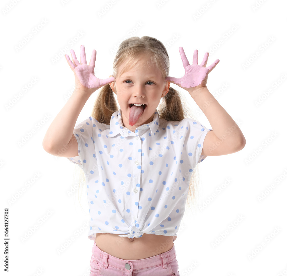 Little girl with hands in pink paint grimacing on white background - obrazy, fototapety, plakaty 