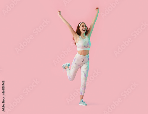 Happy running woman on color background