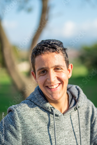 Half body photo of latin teenage boy with black hair