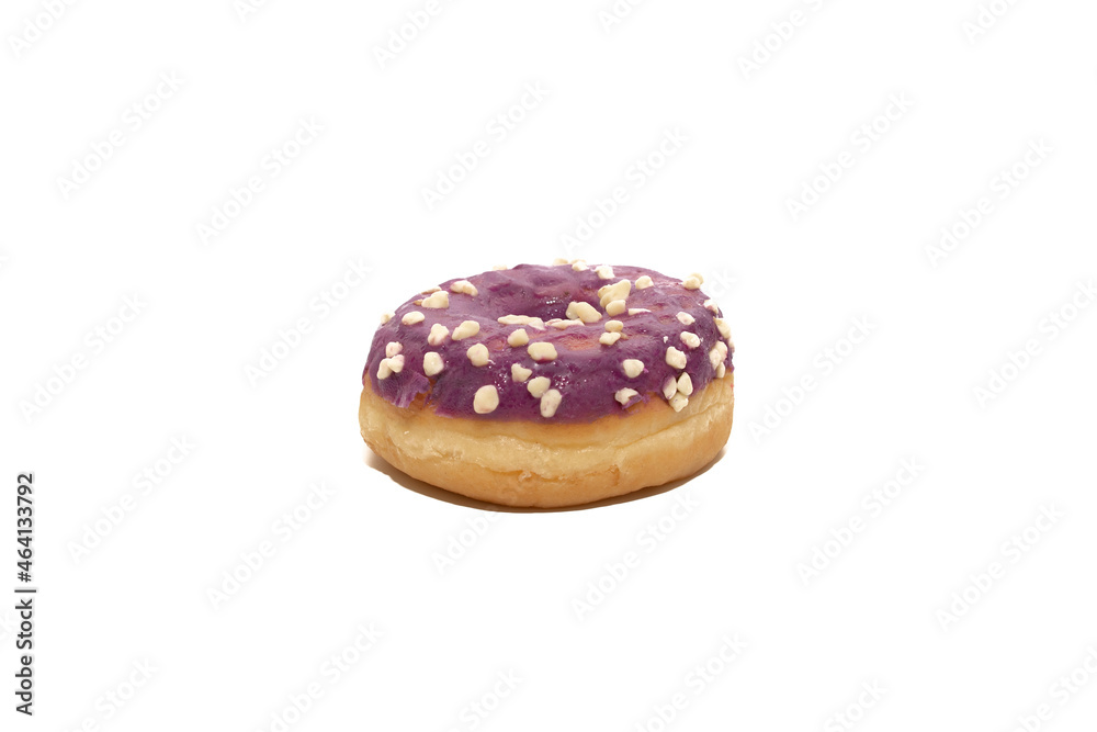 Freshly baked donut isolated on white background. With a blackberry flavor, lilac color. A very tasty and recommended donut.