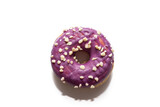 Freshly baked donut isolated on white background. With a blackberry flavor, lilac color. A very tasty and recommended donut.