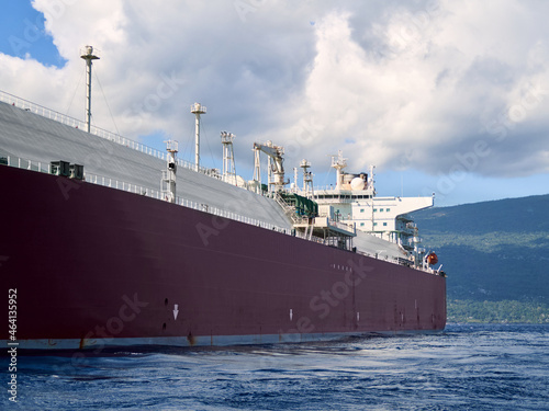 Side view from sealine to the LNG Tanker vessel in open waters near the Grand Comoros coastline.