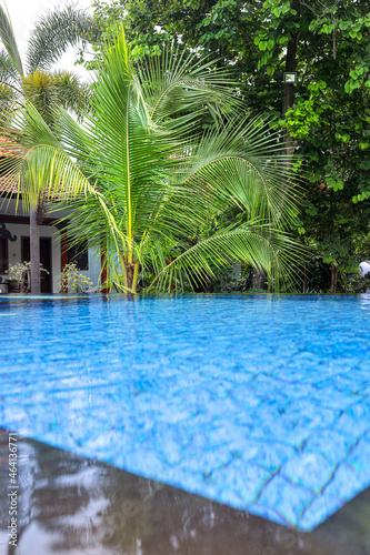 swimming pool in tropical resort © Garuda