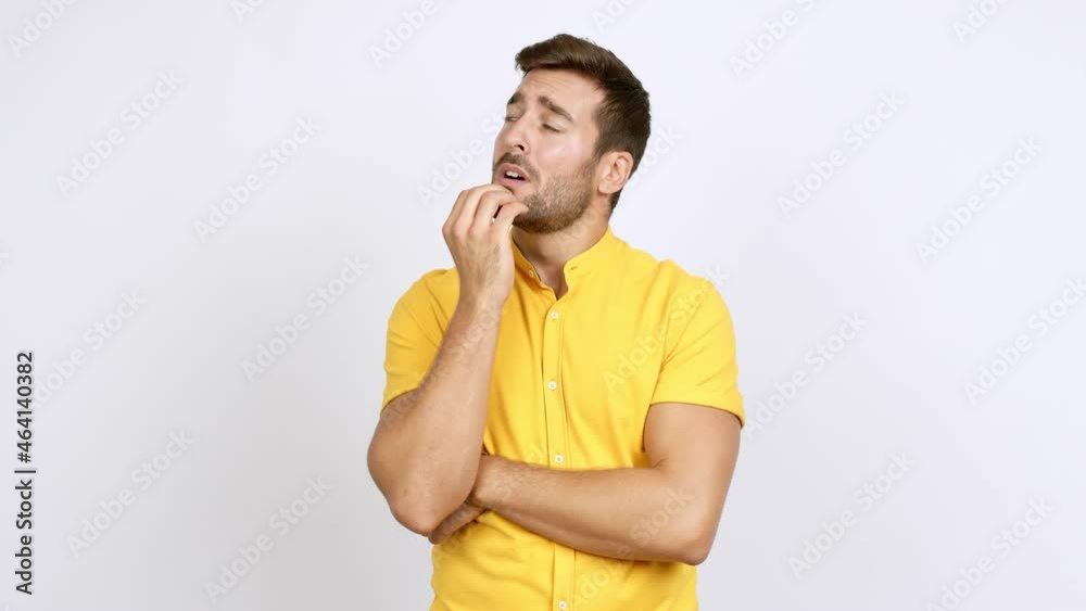 Handsome man having doubts and questioning an idea over isolated background Handsome man having doubts and questioning an idea over isolated background