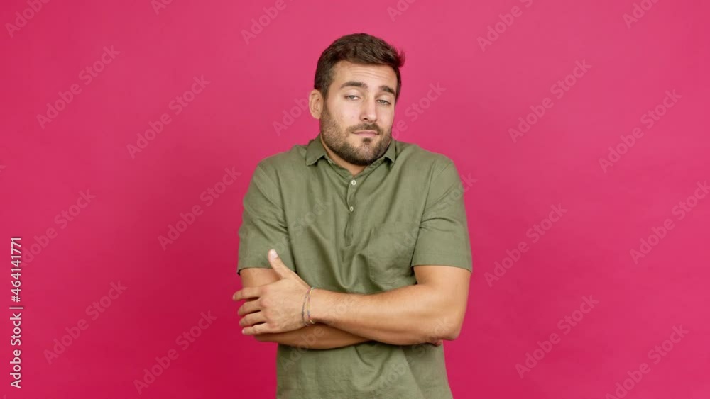 Handsome man making unimportant and doubts gesture while lifting the shoulders and the palms of the hands over isolated background Handsome man making unimportant and doubts gesture while lifting the shoulders and the palms of the hands over isolated background