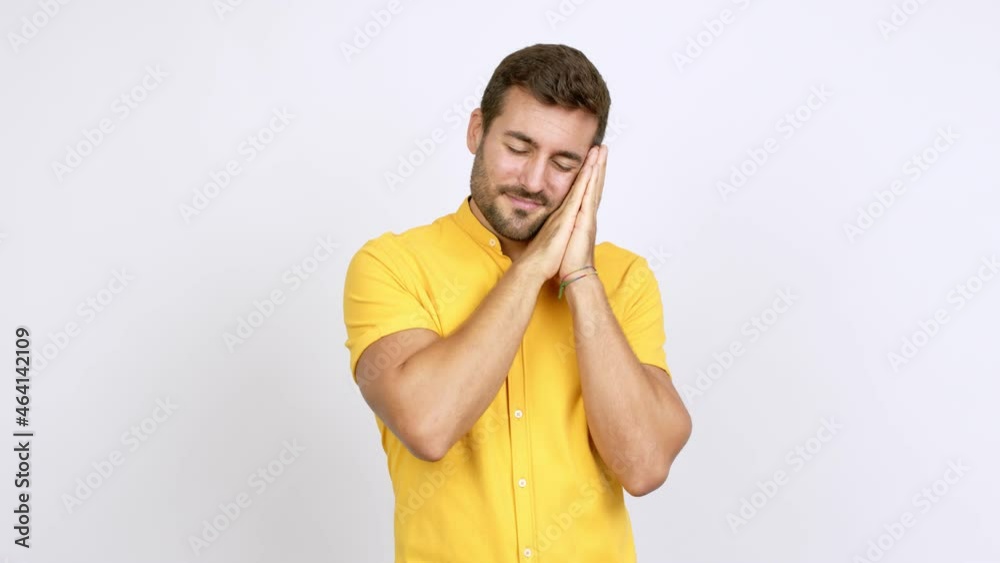 Handsome man making sleep gesture. Adorable and sweet expression over isolated background Handsome man making sleep gesture. Adorable and sweet expression over isolated background