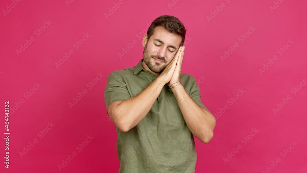 Handsome man making sleep gesture. Adorable and sweet expression over isolated background Handsome man making sleep gesture. Adorable and sweet expression over isolated background
