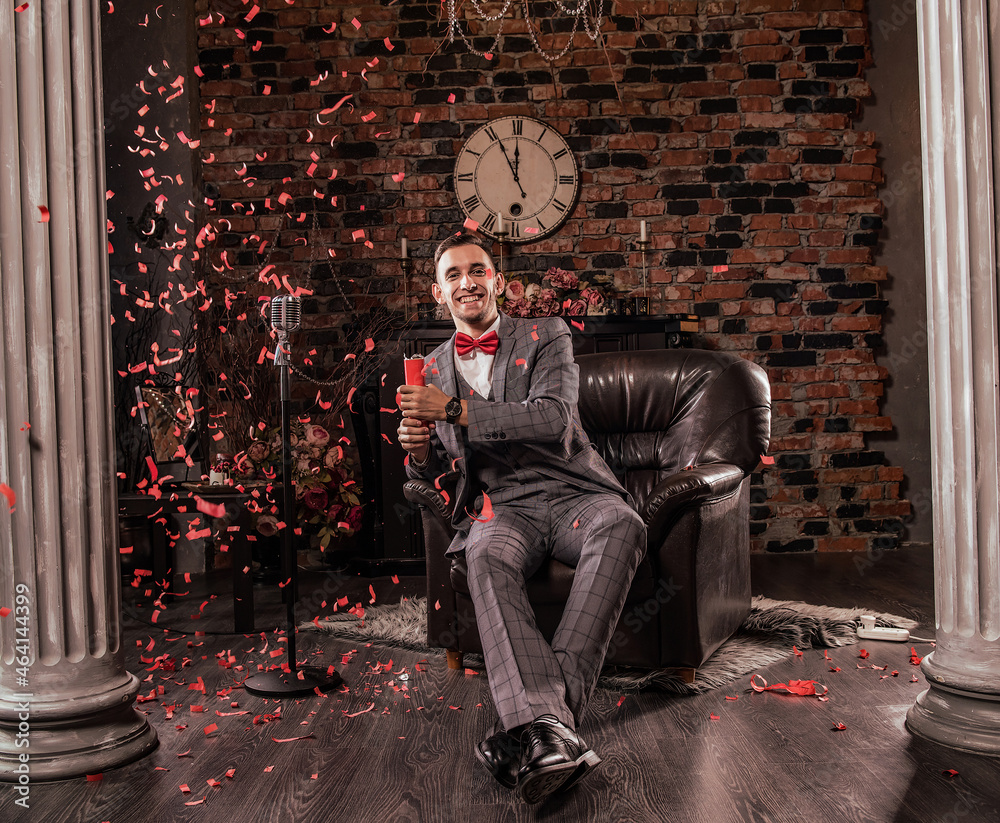man in formal suit with flapper confetti
