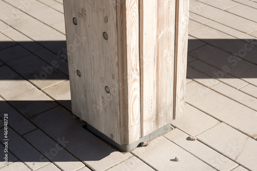 wooden post and sunlight with shadows