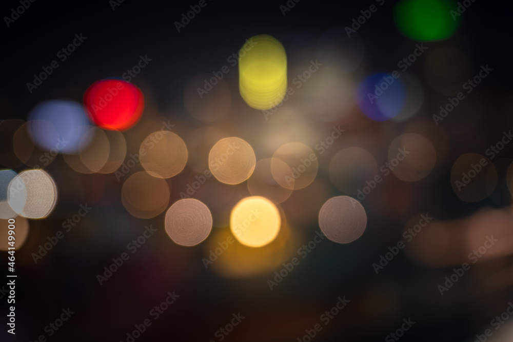 Abstract colorful circular bokeh with city background Abstract colorful circular bokeh with city background