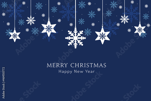Merry Christmas greeting card, design of xmas with snowflakes hanging on blue christmas background.