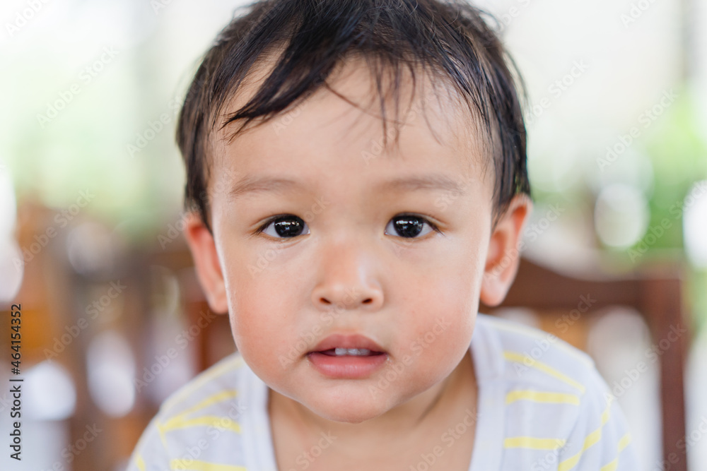 Happy asian boy child showing front teeth with smile and laughing : Healthy happy funny smile baby infant kid.Adorable toddler mixed race kid.portrait asian boy.dental healthcare.milk teeth.handsome. Happy asian boy child showing front teeth with smile and laughing : Healthy happy funny smile baby infant kid.Adorable toddler mixed race kid.portrait asian boy.dental healthcare.milk teeth.handsome.