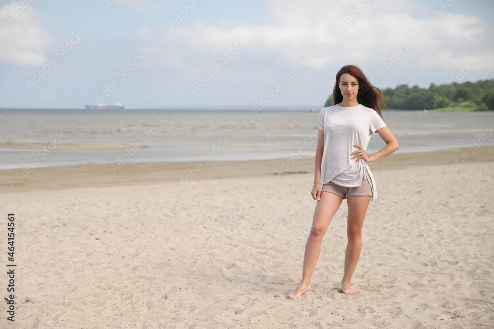 Beautiful woman enjoying summer outdoors