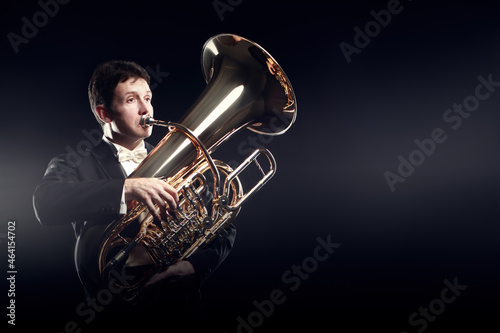 Tuba player brass instruments. Classical musician playing euphonium photo