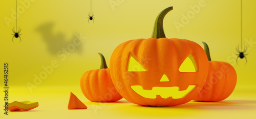 3D-рендеринг. Лампа Джека из оранжевой тыквы с зеленым хвостиком на хэллоуин на желтом фоне  и еще две тыквы с кусочками.