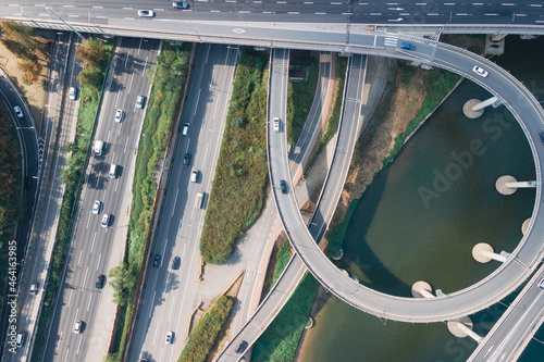 Road junction and bridge in city top view, aerial view.