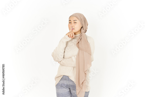 Shh Be Quiet of Beautiful Asian Woman Wearing Hijab Isolated On White Background