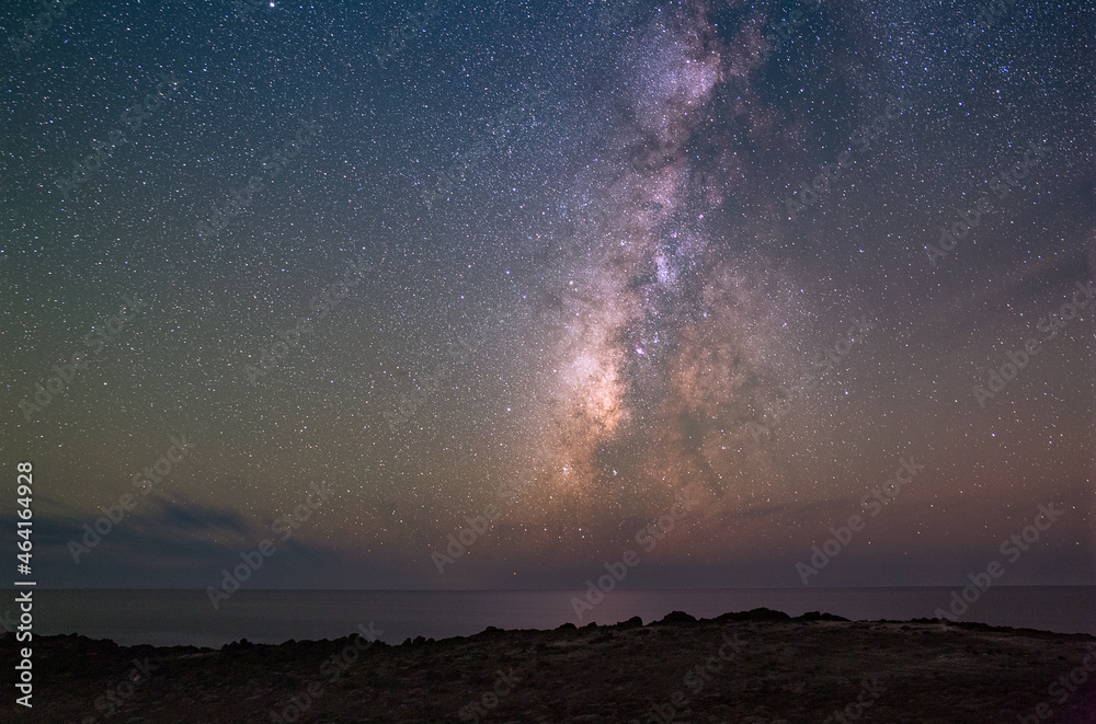 Milky Way Star Filled Clear Night Sky Over Ocean and Land Milky Way Star Filled Clear Night Sky Over Ocean and Land