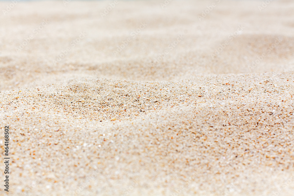 Sand texture background close up, sea sandy beach backdrop, white sand surface top view, yellow sand grains pattern, summer sunny holidays, vacation design, travel, tropical nature, empty copy space Sand texture background close up, sea sandy beach backdrop, white sand surface top view, yellow sand grains pattern, summer sunny holidays, vacation design, travel, tropical nature, empty copy space