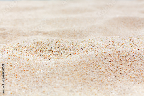 Sand texture background close up, sea sandy beach backdrop, white sand surface top view, yellow sand grains pattern, summer sunny holidays, vacation design, travel, tropical nature, empty copy space