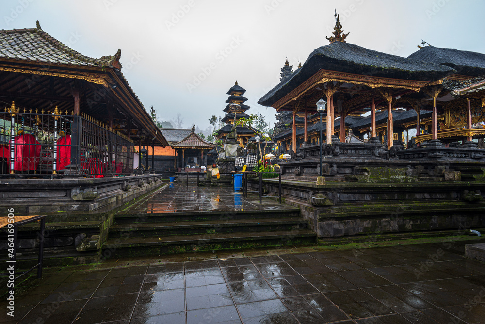Naklejka premium Altars in the Pura Besakih temple on Bali island in Indonesia at a rainy day