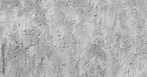 Сoncrete uneven cracked background.