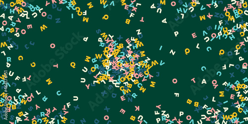 Falling letters of English language. Pastel flying words of Latin alphabet. Foreign languages study concept. Amusing back to school banner on blackboard background.