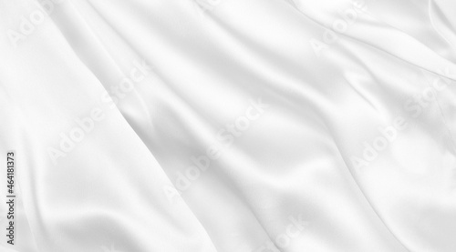 Elegance white satin silk with waves, abstract background luxury cloth, elegant wallpaper design. Abstract background luxury cloth or liquid wave