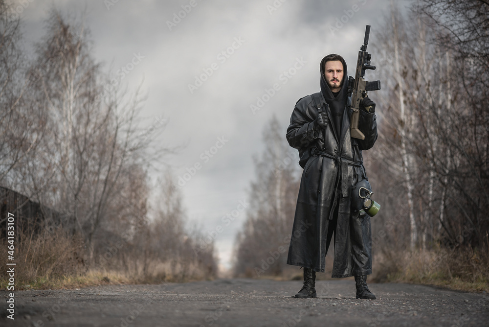 Naklejka premium Concept of post apocalypse survivor with a rifle.
