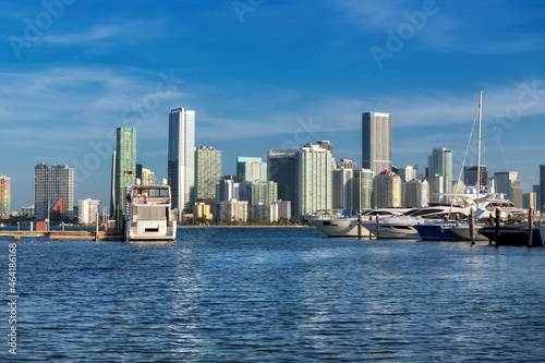 Luxury yachts moored in the harbor and Miami Downtown skyline at sunny morning, Miami, Florida. © lucky-photo