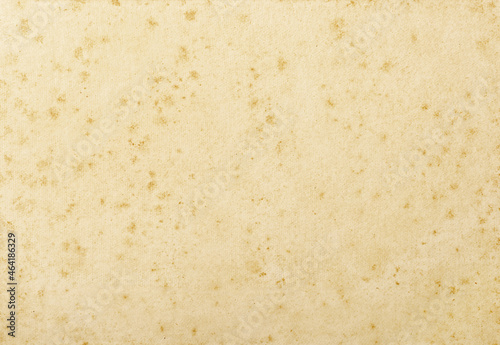 background of empty stained old paper, top view