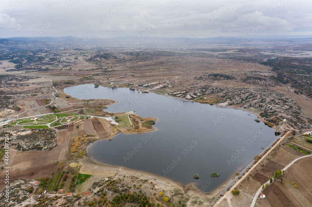 Emre Lake (Gölü) Historical Phrygian (Frig) valley within the boundaries of nature park a beautiful pond where you can have fun with bikes, canoe, ATV tours. Aerial view, Afyon - TURKEY Emre Lake (Gölü) Historical Phrygian (Frig) valley within the boundaries of nature park a beautiful pond where you can have fun with bikes, canoe, ATV tours. Aerial view, Afyon - TURKEY