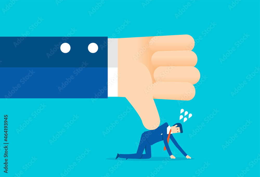 Businessman thumbs down to failing to work Businessman thumbs down to failing to work