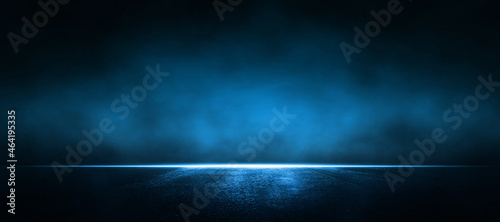 Asphalt blue dark street with smoke. Empty dark scene with neon light.Rays, spotlights light 