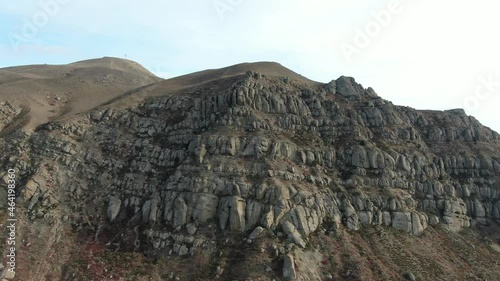 Stone Rock Going Down To The Sea. Wonders of Nature, Fantastic Show. Cape Meganom, Crimea 2020 photo
