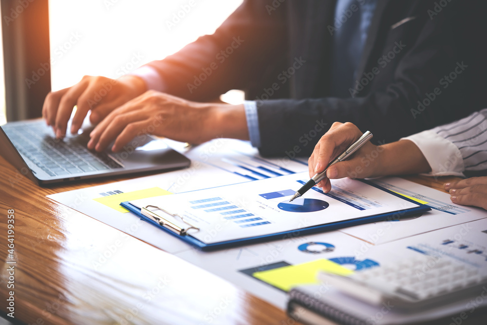 Team work with business analytic price chart on the table at the conference room. Team work with business analytic price chart on the table at the conference room.