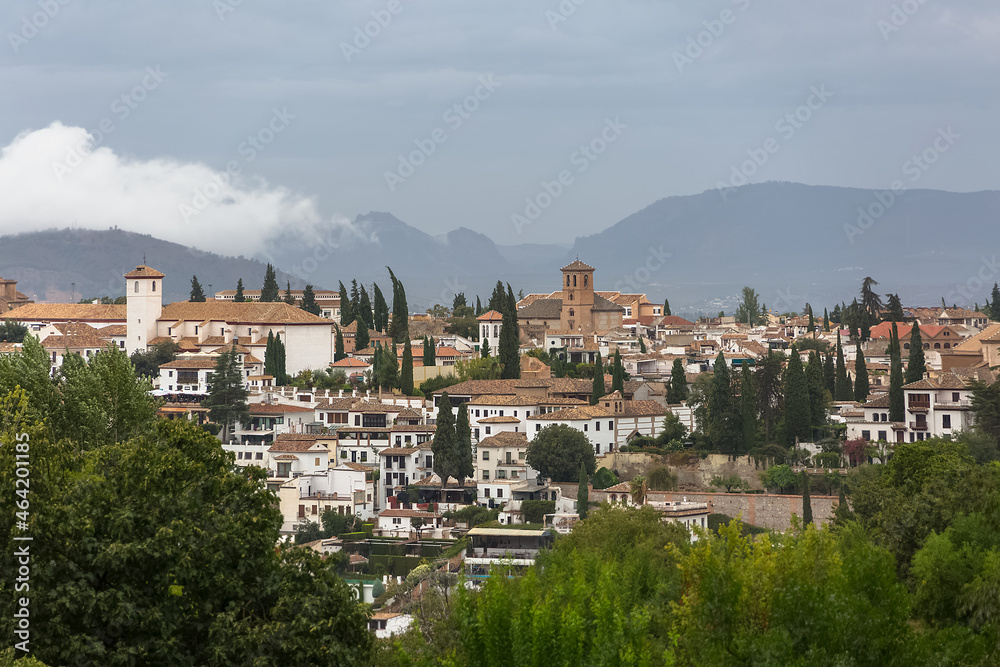 View at the main Granada city, view from the Alhambra citadel palace lookout, architecture buildings and horizon, Spain