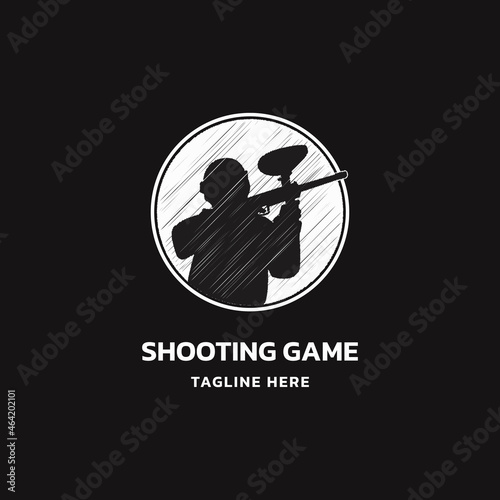 shooting game logo with paint balls. soldier silhouette.