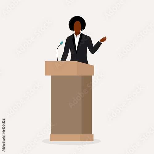 Black Woman Public Speaker Giving Speech At A Podium. photo