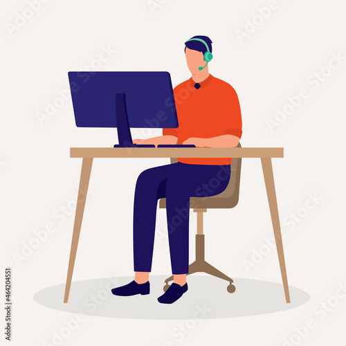 Male Customer Support Representative With Headset Working With Computer. © simplehappyart