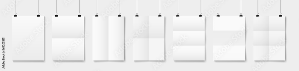 Folded blank posters hang with binder clips. White paper sheets with crossing creases hanging on rope. Empty A4 sized vector paper frame mockup. Folded blank posters hang with binder clips. White paper sheets with crossing creases hanging on rope. Empty A4 sized vector paper frame mockup.
