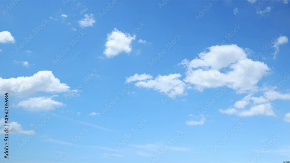 4K Sky Time lapse, Beautiful background, Sky Timelapse of skyscrapers. Blue sky white clouds. Puffy fluffy white clouds. Cumulus cloud cloudscape timelapse. Summer blue sky time lapse. Nature weather 