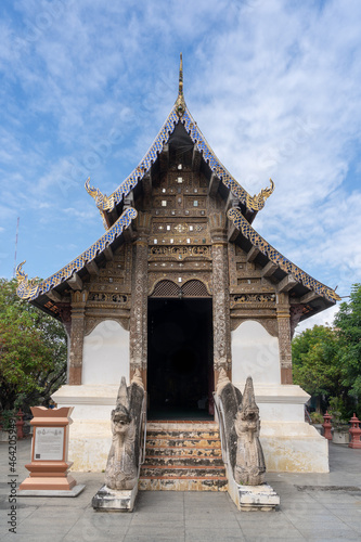 Front view of beautiful ancient Lanna style viharn inside compound of historic Wat Prasat buddhist temple, Chiang Mai, Thailand