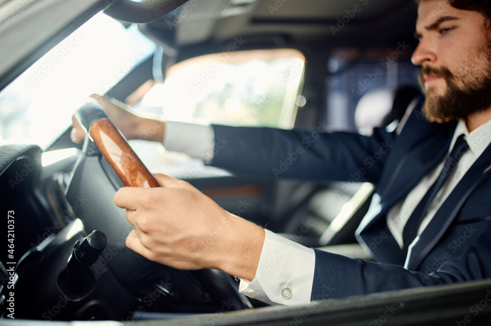 bearded man in a suit in a car a trip to work success service rich bearded man in a suit in a car a trip to work success service rich