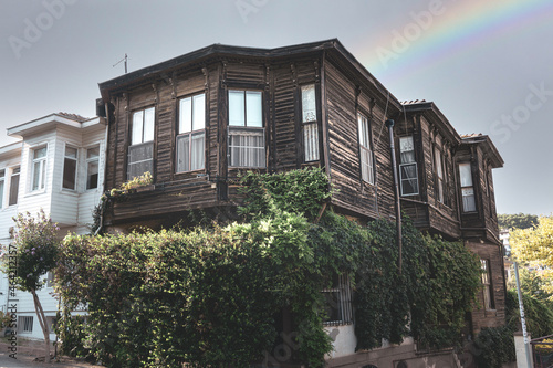 Photography Ancient home under white sky with rainbow in Heybeliada, Prince Islands, Istanbul