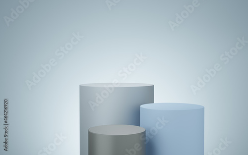 3 Empty gray and blue cylinder podium floating on white copy space background. Abstract minimal studio 3d geometric shape object. Pedestal mockup space for display of product design. 3d rendering. © media-ja