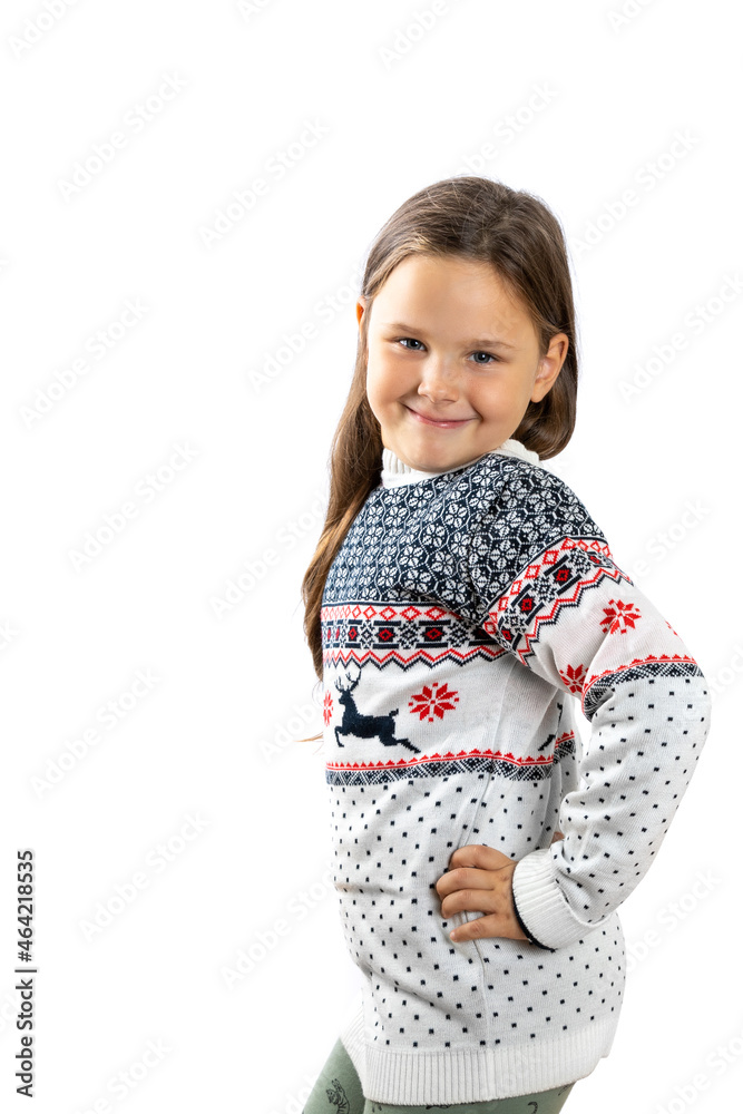 girl in white knitted Christmas sweater with reindeer poses with hand on waist, isolated on white background. girl in white knitted Christmas sweater with reindeer poses with hand on waist, isolated on white background.