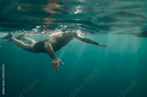 Underwater view of man snorkeling © yossarian6