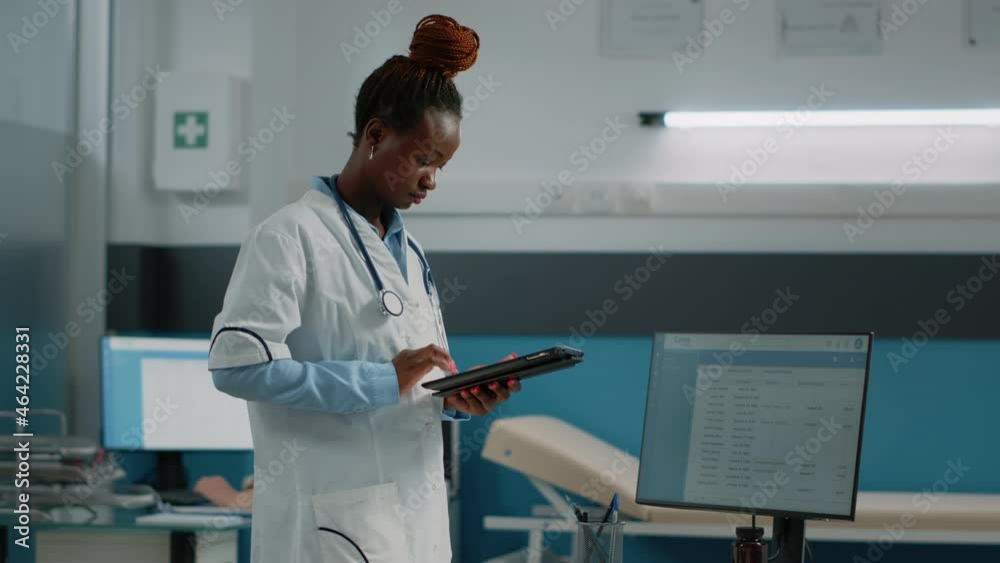 Woman doctor holding digital tablet with touch screen for healthcare appointments. Medic working with modern device with technology and medical equipment for checkup visits with patients